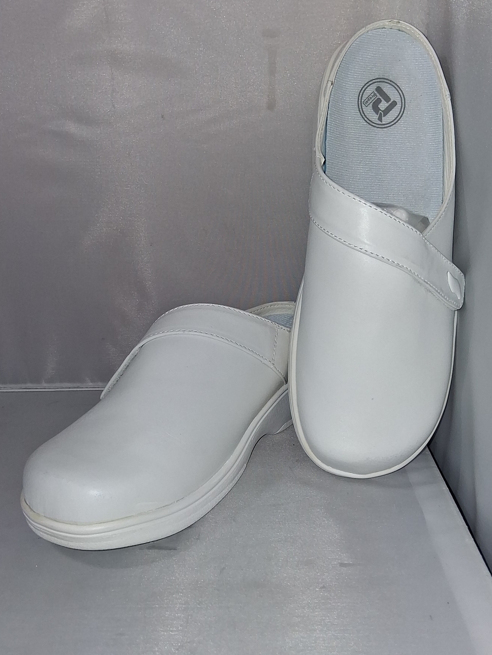 Propét white leather slip-ins
